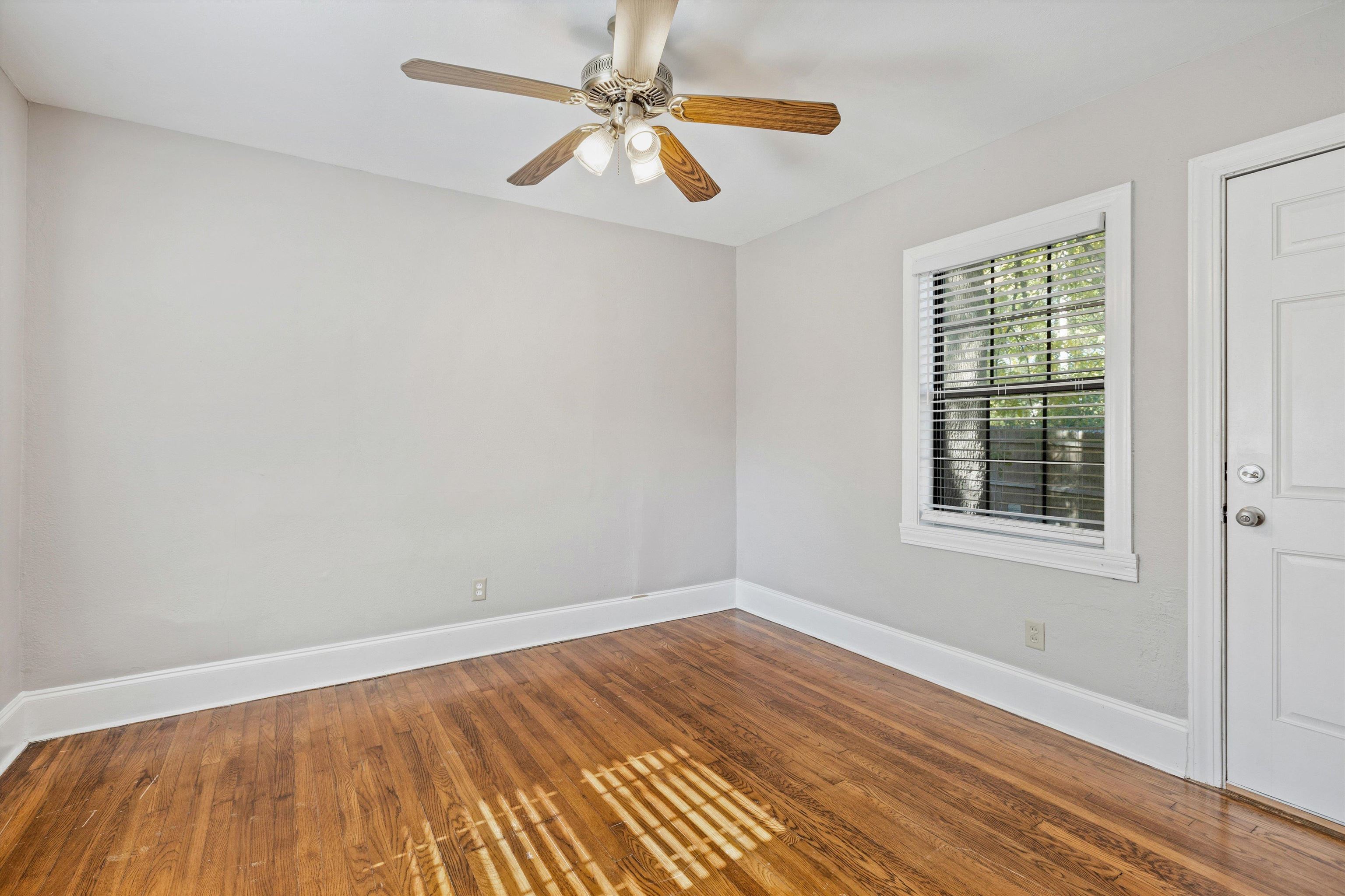 1011 Philadelphia Street Memphis, TN 38104 - Photo 21 of 26 a view of a room with wooden floor and fan