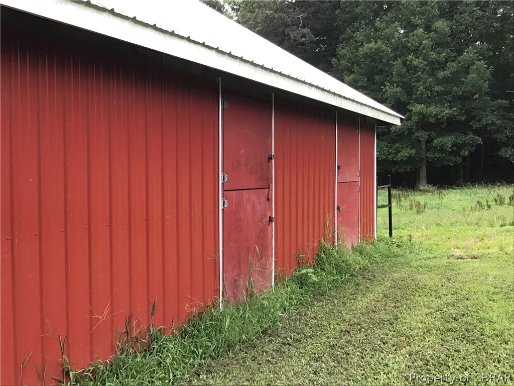 9924 Squirrel Run Road Gloucester, VA 23061 - Photo 20 of 37 View of outbuilding with a yard