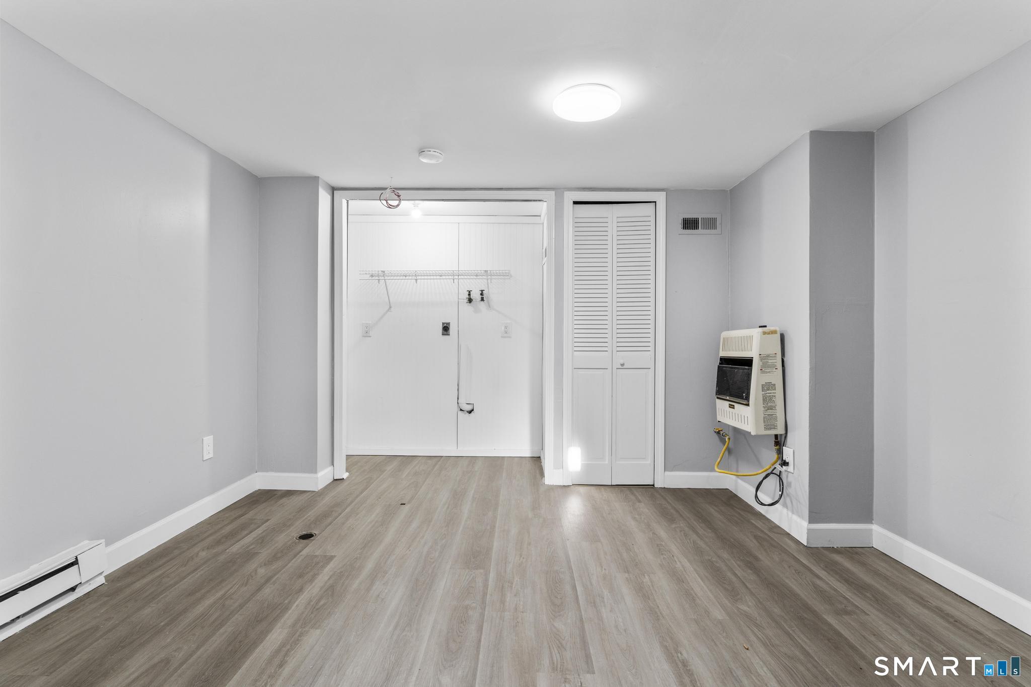 257 North State Street Ansonia, CT 06401 - Photo 14 of 39 a view of empty room with wooden floor