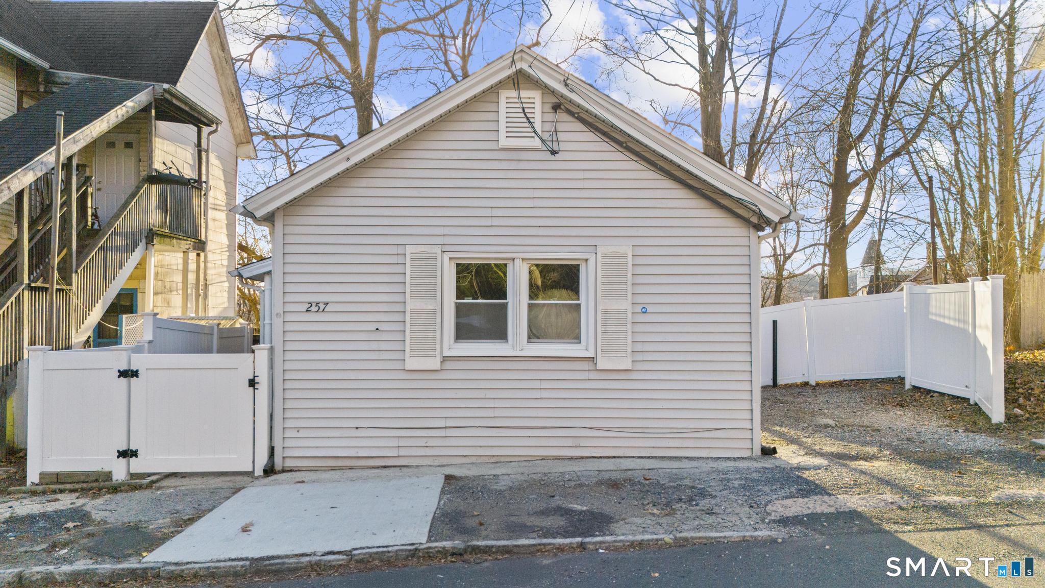 257 North State Street Ansonia, CT 06401 - Photo 39 of 39 a view of a house with a yard