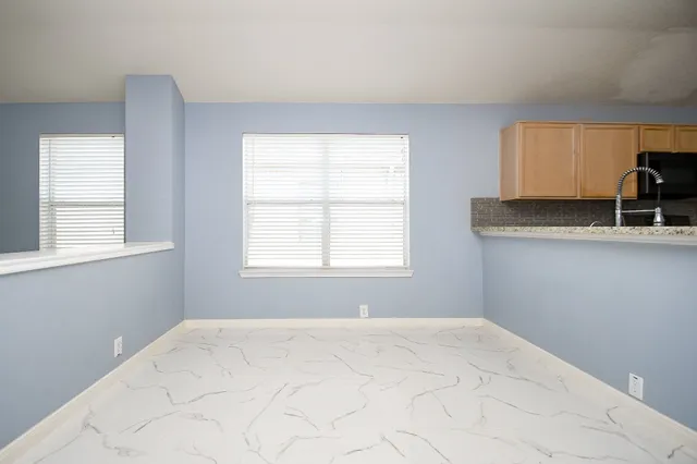 a view of a room with a window