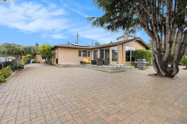 a view of a house with a patio
