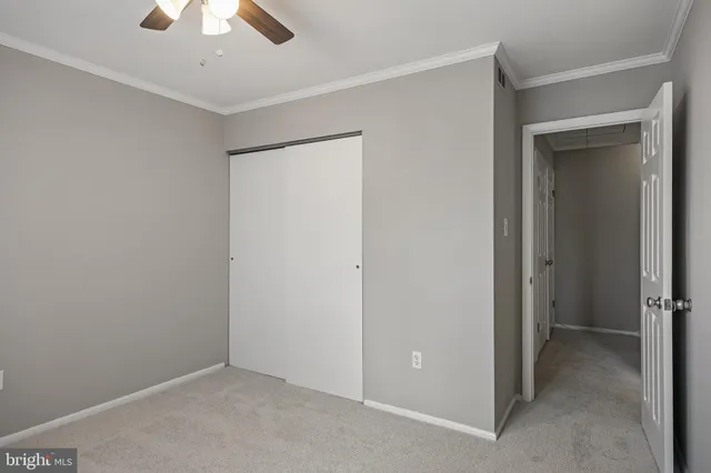 an empty room with a bathroom