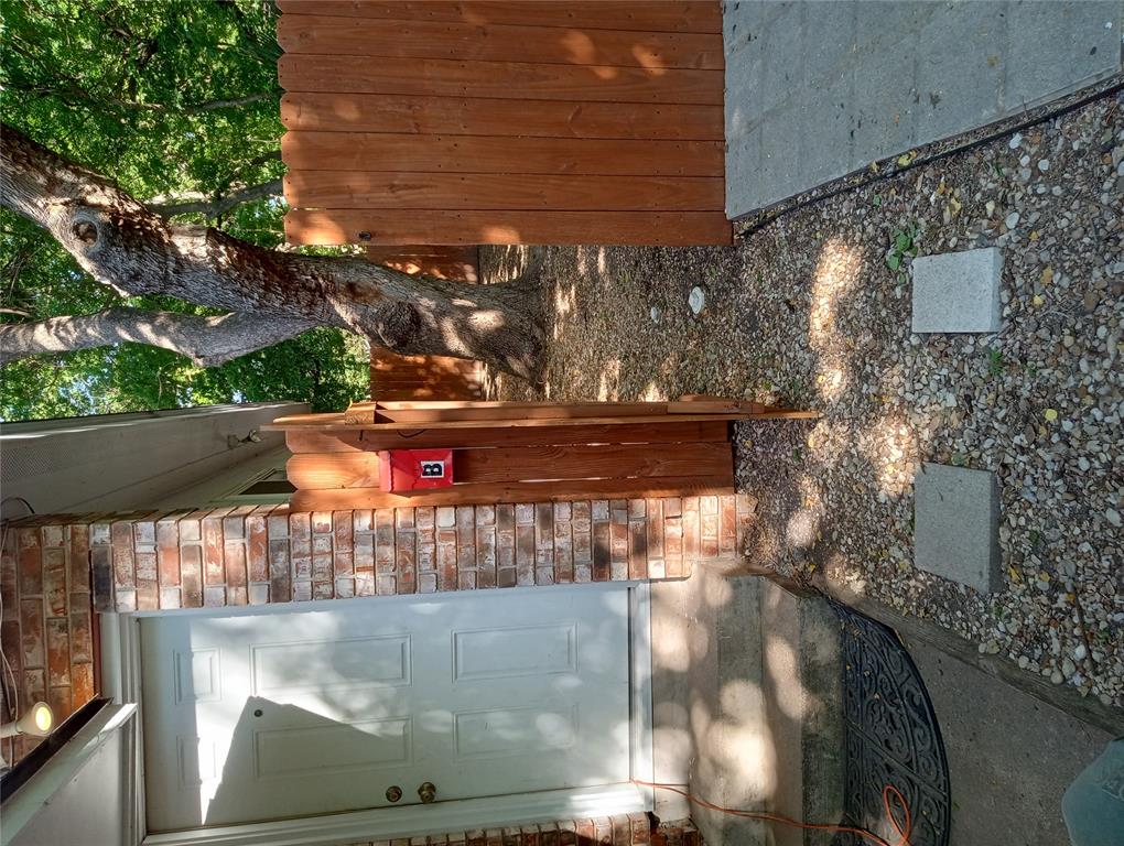 Exterior view of brick siding and stone siding