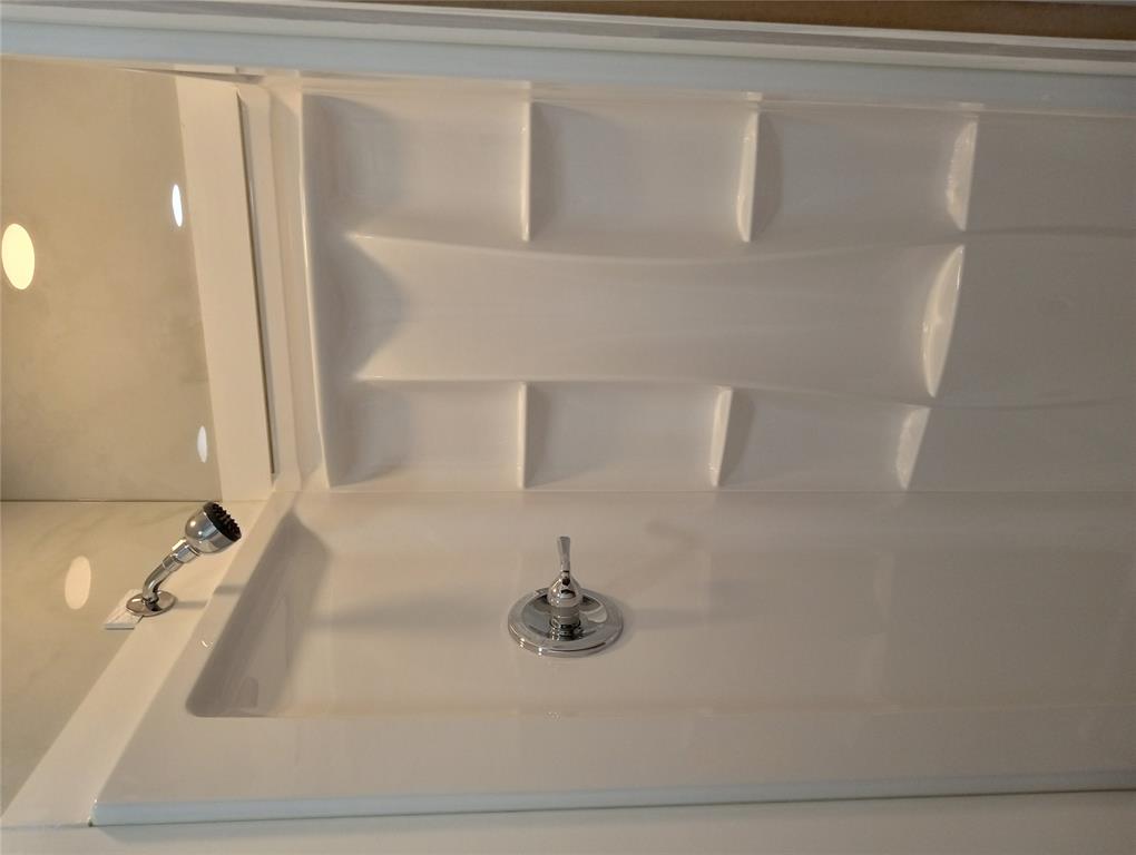 4500 Avenue D, Unit B Austin, TX 78751 - Photo 11 of 16 Bathroom view of a shower stall