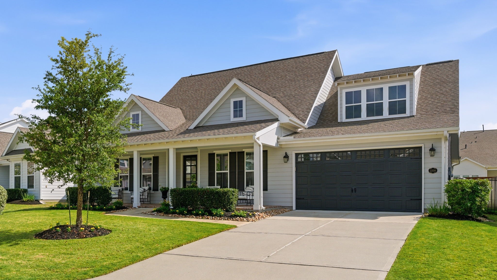 2208 Salt Grass Trail Conroe, TX 77384 - Photo 2 of 34 2208 Salt Grass Trail is located at the top of a hill within Sweetwater. Take yourself for a stroll to the park and water feature area just down the street. The owners love the fact that this home is in a high and dry location!