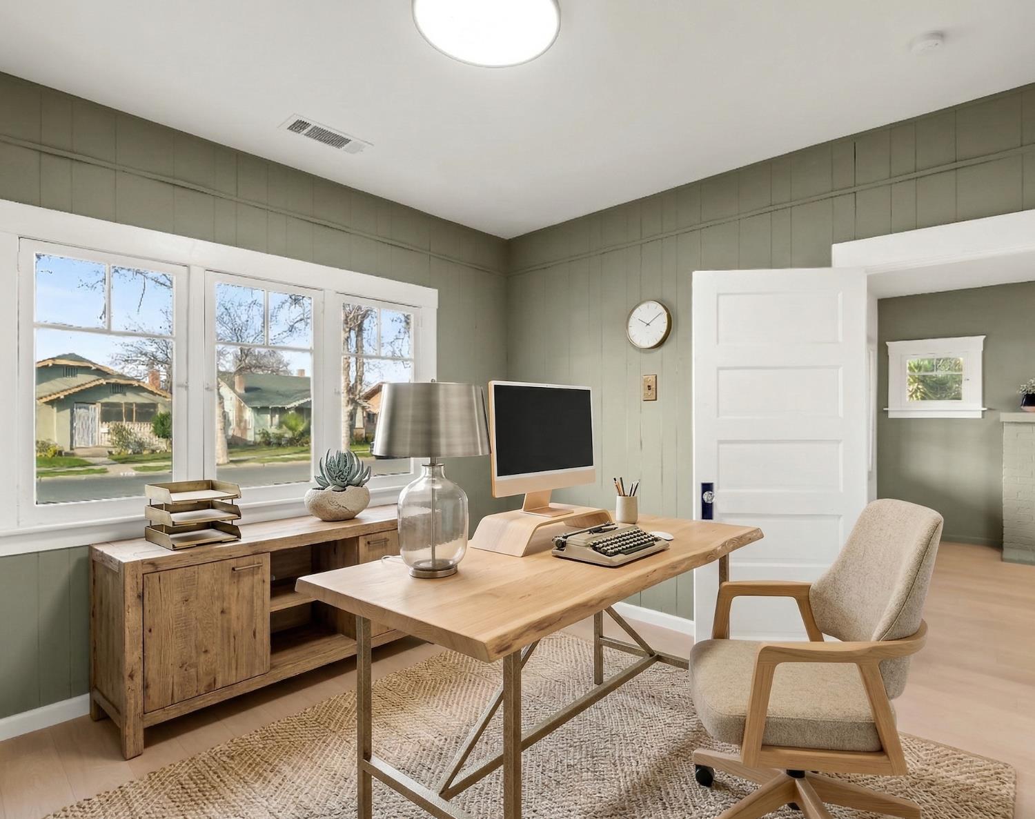 425 West Elm Street Hanford, CA 93230 - Photo 10 of 18 a workspace with furniture wooden floor and a window
