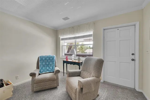 a living room with furniture or couch and a window