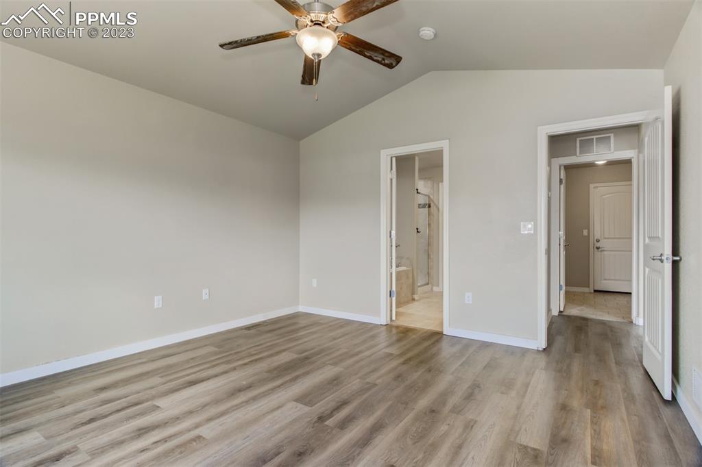 10034 Intrepid Way Colorado Springs, CO 80925 - Photo 15 of 31 wooden floor in an empty room