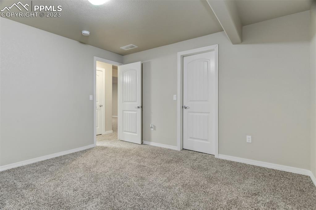 10034 Intrepid Way Colorado Springs, CO 80925 - Photo 23 of 31 a view of an empty room