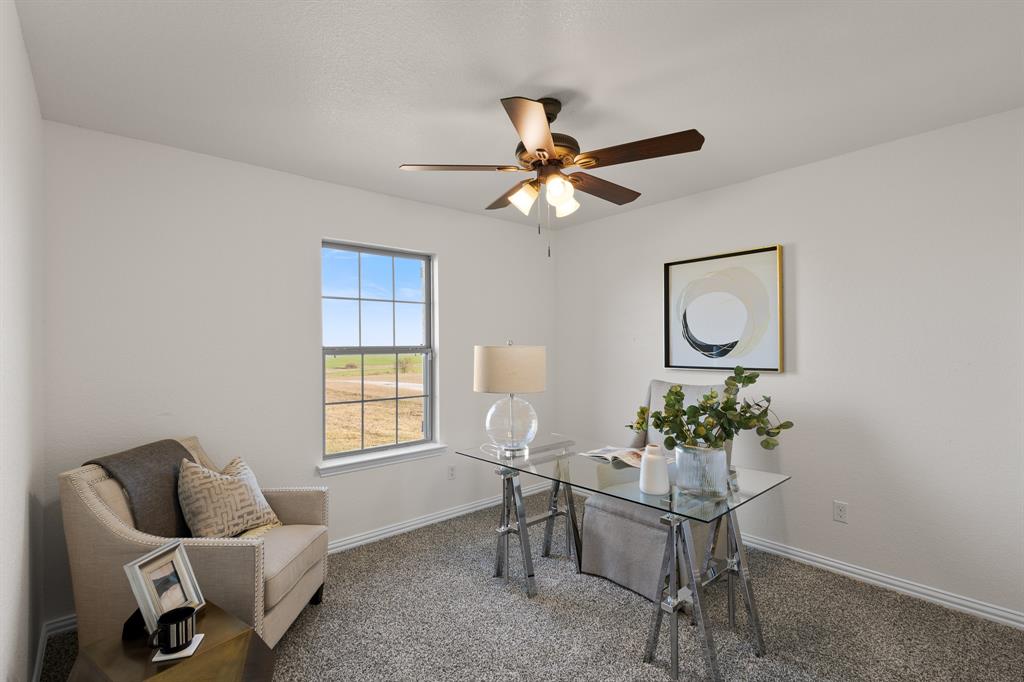 186 County Road 4430 Rhome, TX 76078 - Photo 25 of 40 a living room with furniture