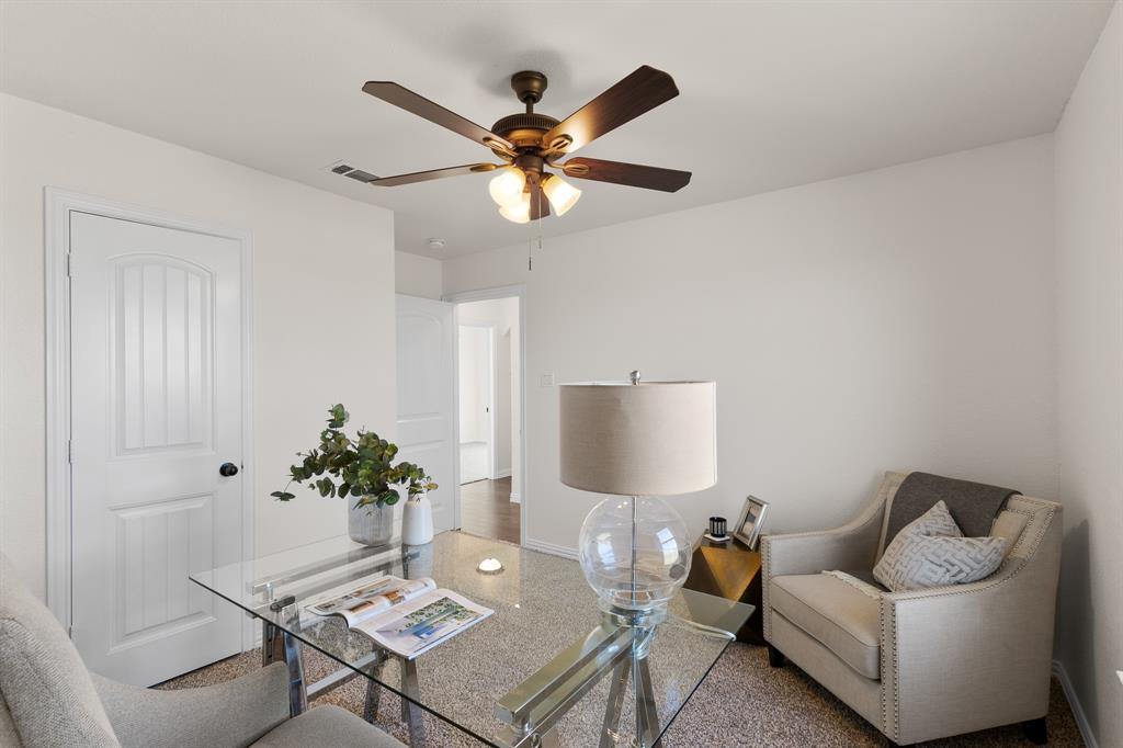 186 County Road 4430 Rhome, TX 76078 - Photo 26 of 40 a living room with furniture