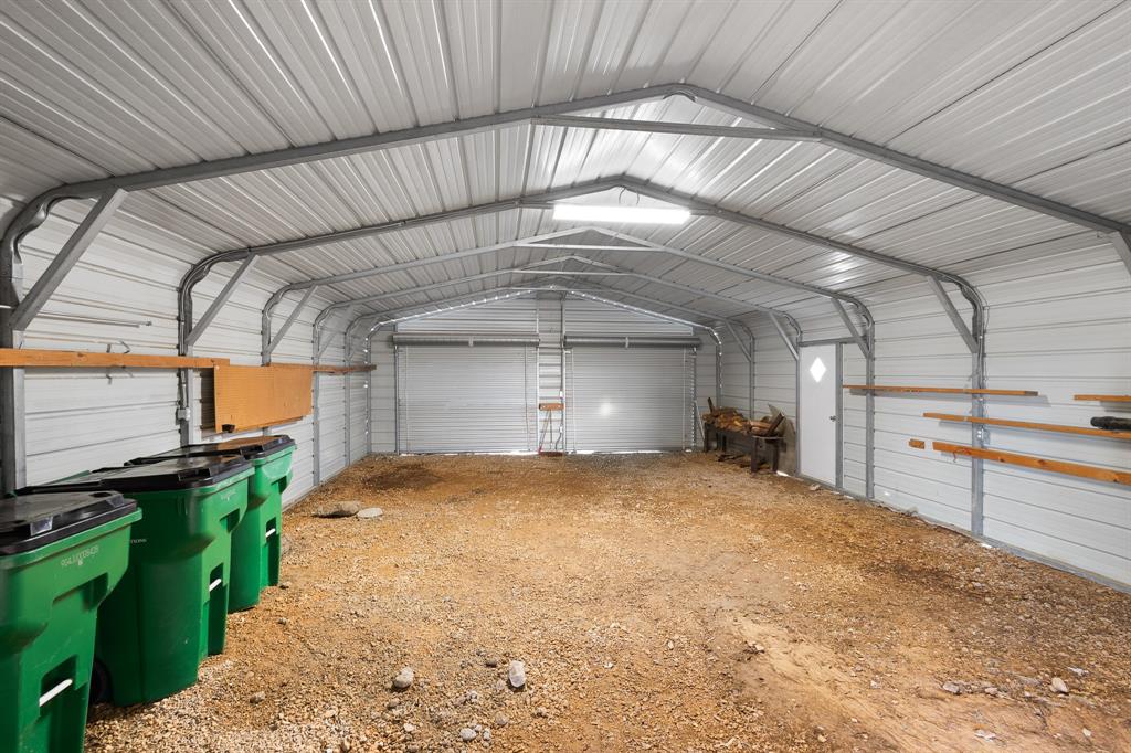 186 County Road 4430 Rhome, TX 76078 - Photo 39 of 40 a view of a garage