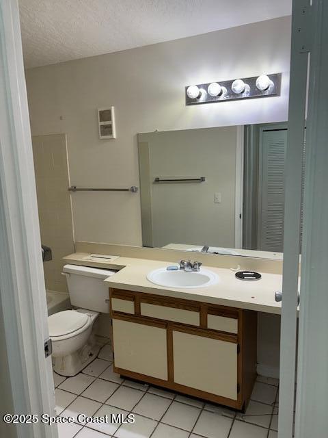7667 North Wickham Road, Unit 720 Melbourne, FL 32940 - Photo 18 of 28 a bathroom with a granite countertop toilet sink and mirror