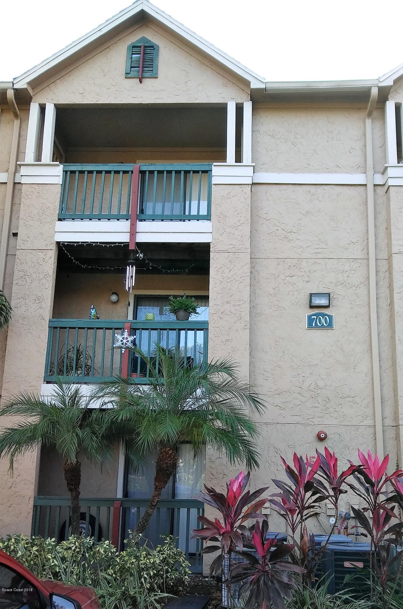 7667 North Wickham Road, Unit 720 Melbourne, FL 32940 - Photo 2 of 28 a front view of small house