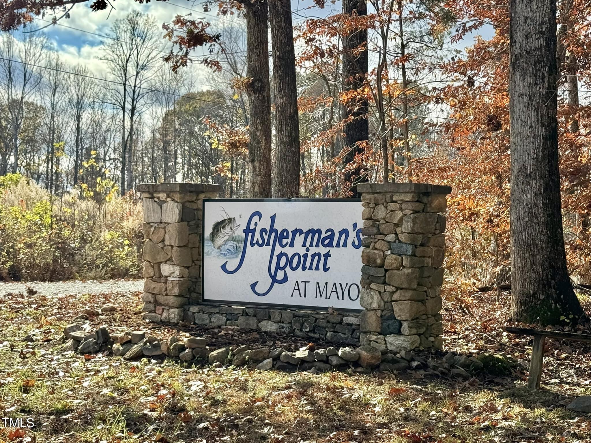 22.5-acres Fishermans Point Road Roxboro, NC 27574 - Photo 3 of 6 a sign that is sitting on a brick wall