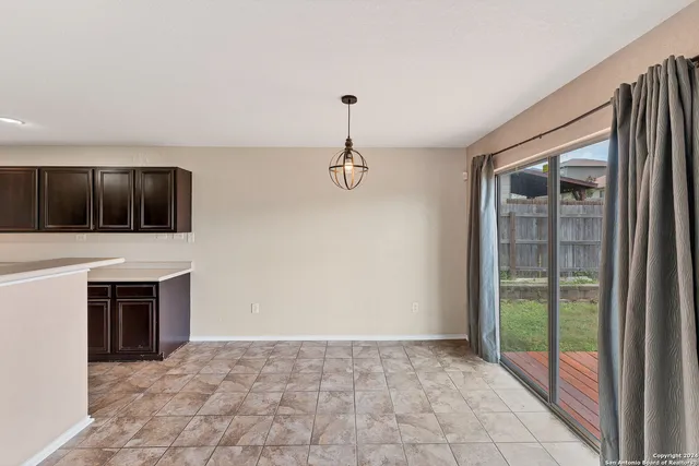 a room with fireplace and window