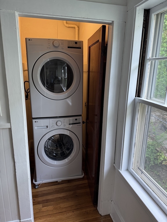 13-15 Upland Road, Unit 1 Somerville, MA 02144 - Photo 11 of 12 a utility room with washing machine and a window