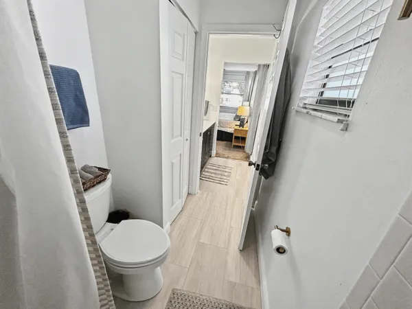 a bathroom with a sink and toilet