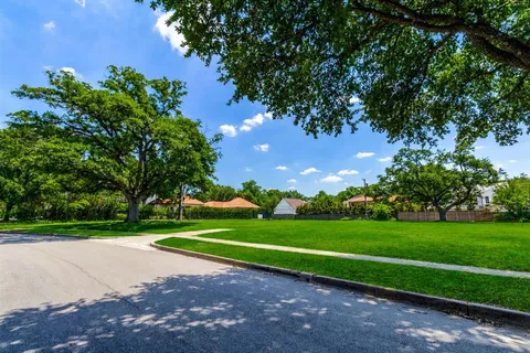 an aerial view of a houses with outdoor space