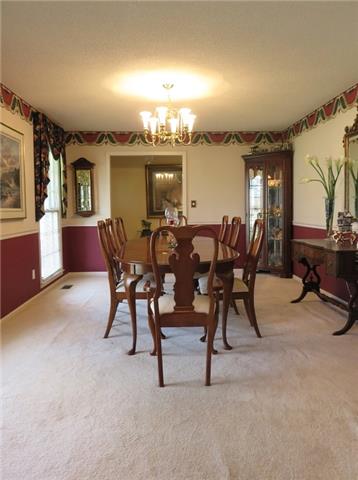 200 12 Oaks Road Tullahoma, TN 37388 - Photo 10 of 19 Formal Living Room currently used and dining room. Very nice size.