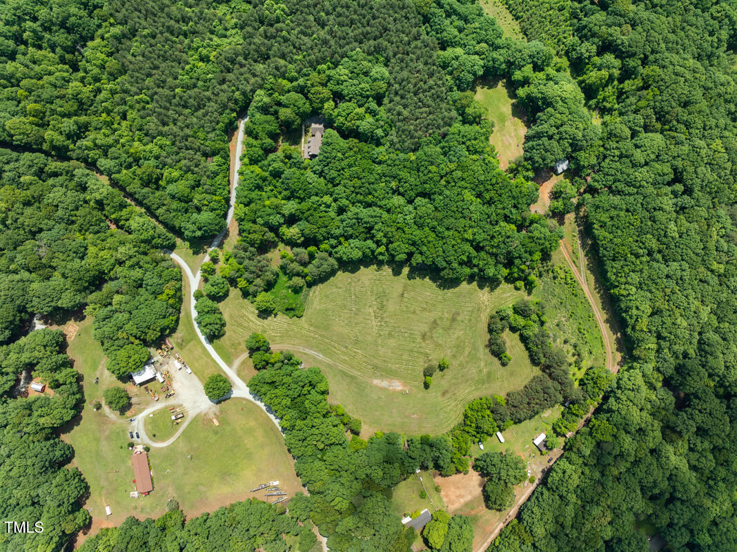 2853 Franklin Road Hillsborough, NC 27278 - Photo 8 of 18 an aerial view of residential house with outdoor space and trees all around