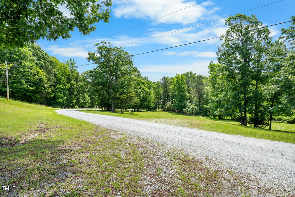 2853 Franklin Road Hillsborough, NC 27278 - Photo 9 of 18 a view of a yard with a house