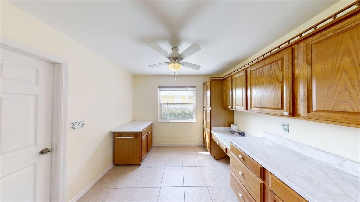 137 Concha Drive Sebastian, FL 32958 - Photo 4 of 21 a bathroom with a tub sink and mirror