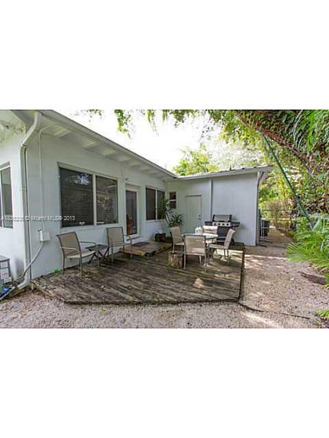 5767 Southwest 35th Street Miami, FL 33155 - Photo 14 of 18 a picture of a house with a outdoor space