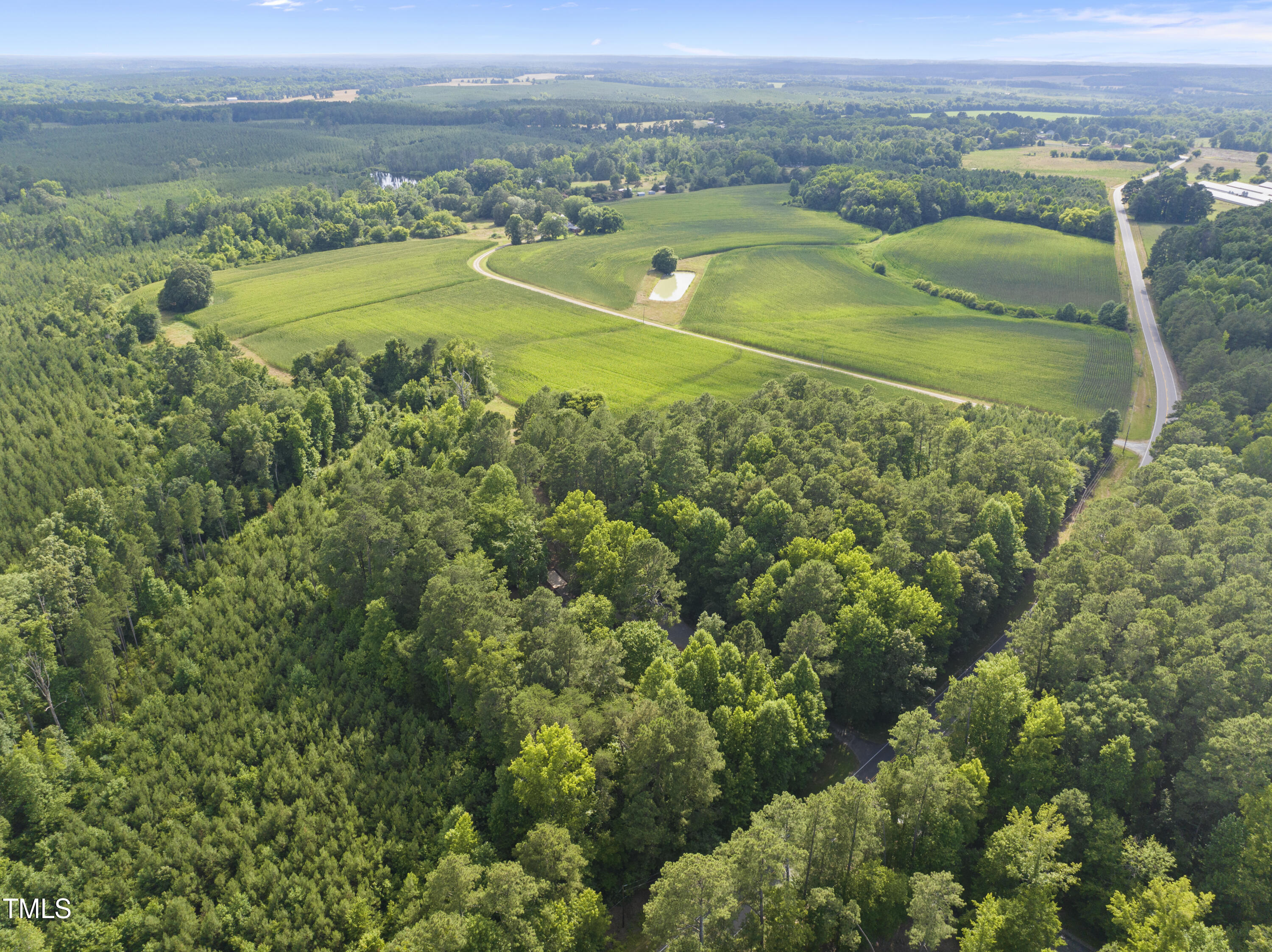 6319 Carbonton Road Sanford, NC 27330 - Photo 1 of 19 an aerial view of a houses with a outdoor space