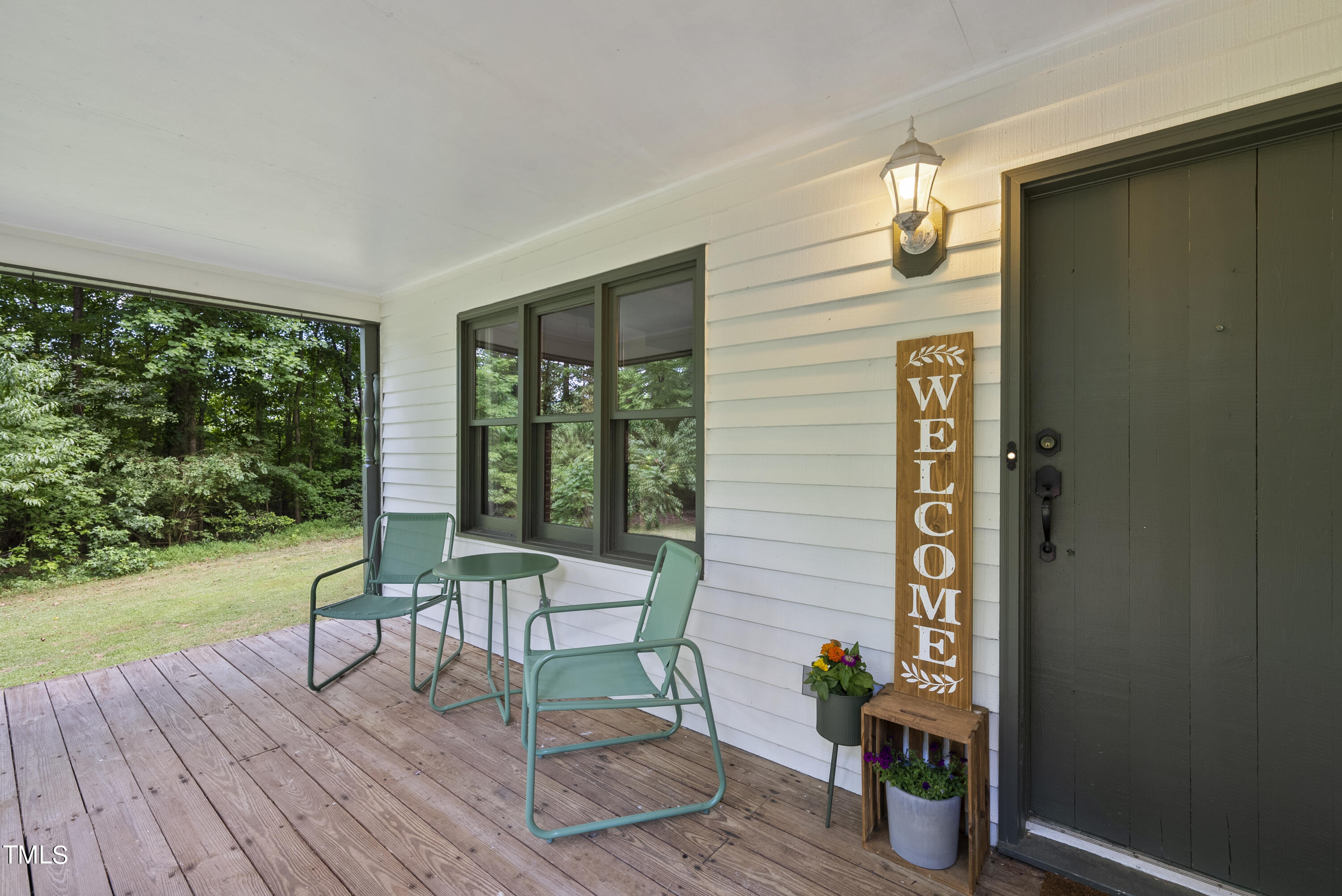 6319 Carbonton Road Sanford, NC 27330 - Photo 5 of 19 a view of a house with backyard and sitting area