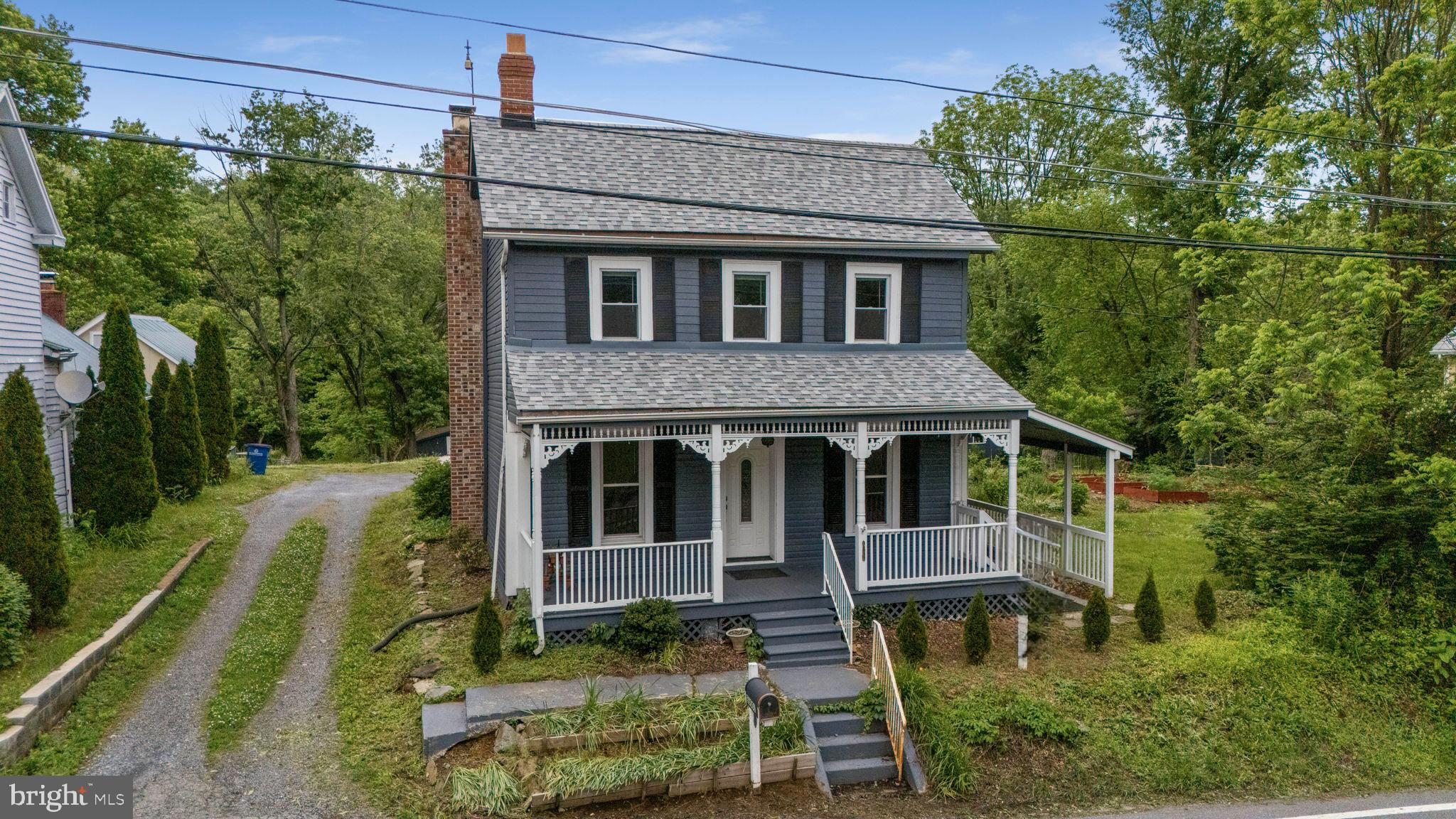 26001 Frederick Road Clarksburg, MD 20871 - Photo 2 of 46 a aerial view of a house with a yard balcony