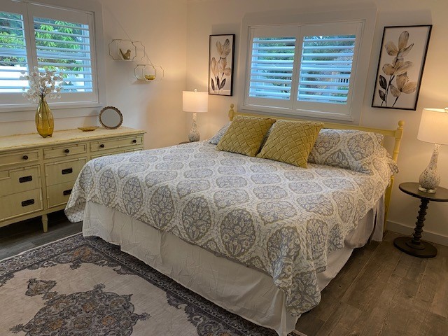 3816 Mockingbird Drive Vero Beach, FL 32963 - Photo 11 of 19 a bedroom with a bed and window