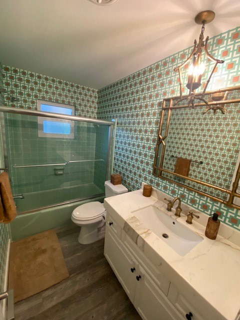 3816 Mockingbird Drive Vero Beach, FL 32963 - Photo 13 of 19 a bathroom with a sink toilet and shower