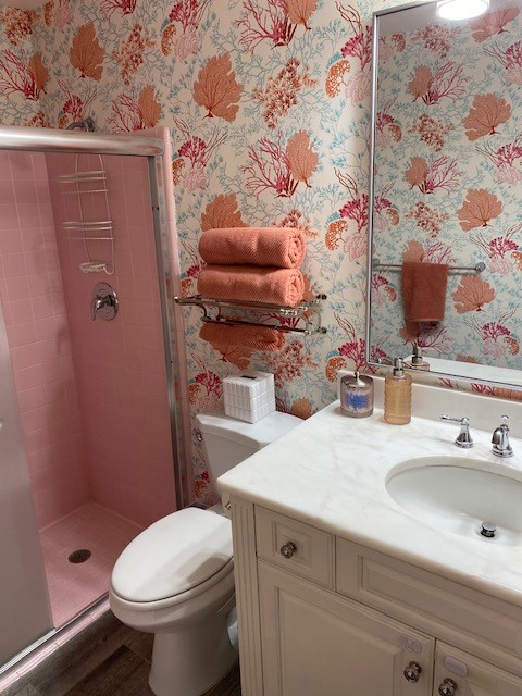 3816 Mockingbird Drive Vero Beach, FL 32963 - Photo 16 of 19 a bathroom with a sink toilet and shower