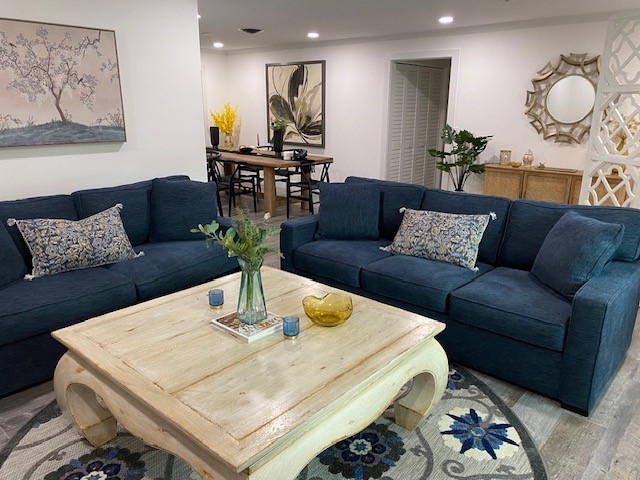 3816 Mockingbird Drive Vero Beach, FL 32963 - Photo 3 of 19 a living room with furniture and wooden floor