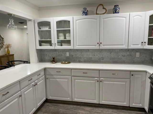 3816 Mockingbird Drive Vero Beach, FL 32963 - Photo 6 of 19 a sink with white cabinets
