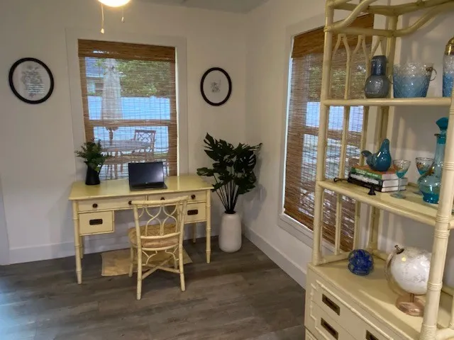 a kitchen with a table and chairs in it