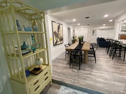 a view of a dining room with furniture