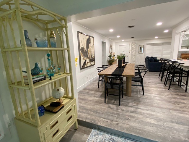 3816 Mockingbird Drive Vero Beach, FL 32963 - Photo 9 of 19 a view of a dining room with furniture