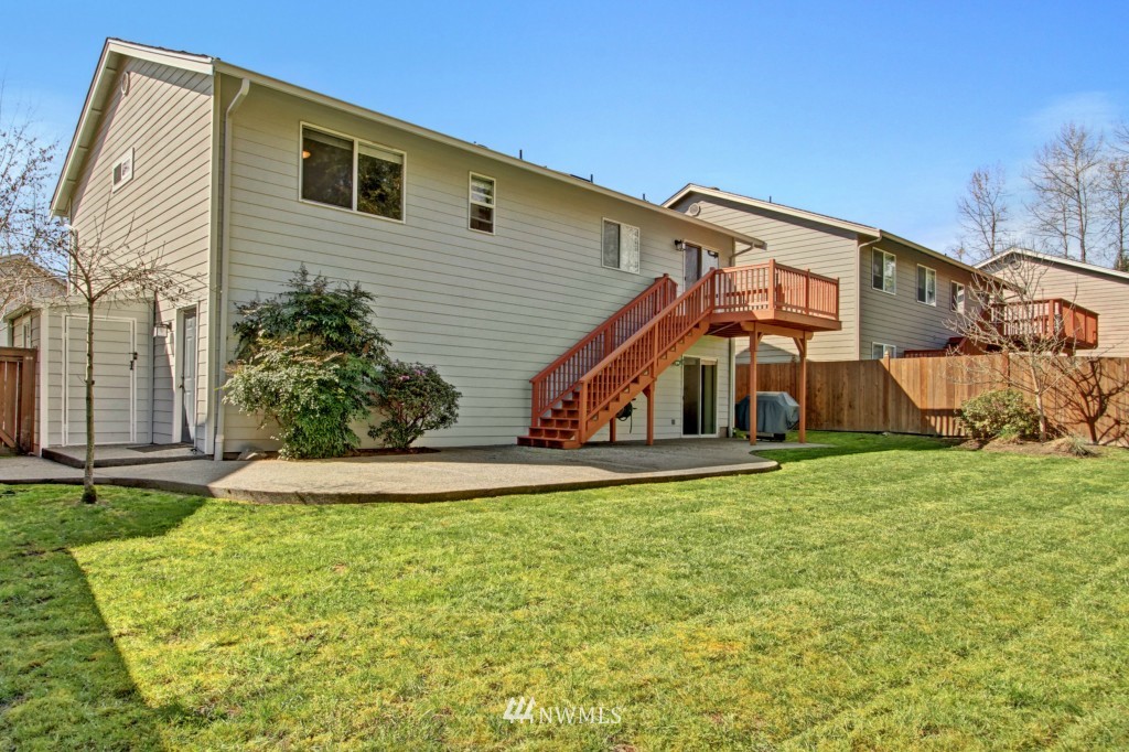 24219 13th Place West Bothell, WA 98021 - Photo 2 of 18 a view of a house with a yard