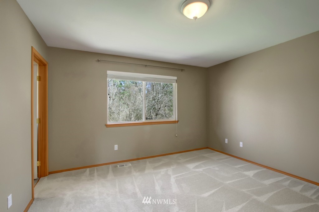 24219 13th Place West Bothell, WA 98021 - Photo 13 of 18 an empty room with a window
