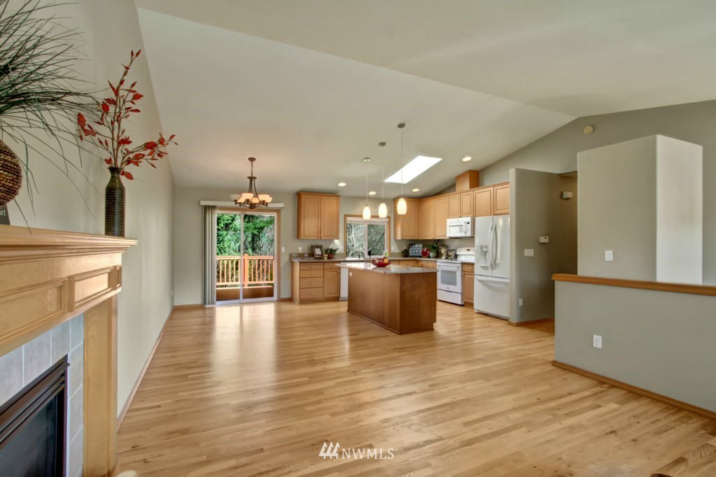 24219 13th Place West Bothell, WA 98021 - Photo 7 of 18 a living room with furniture and a fireplace