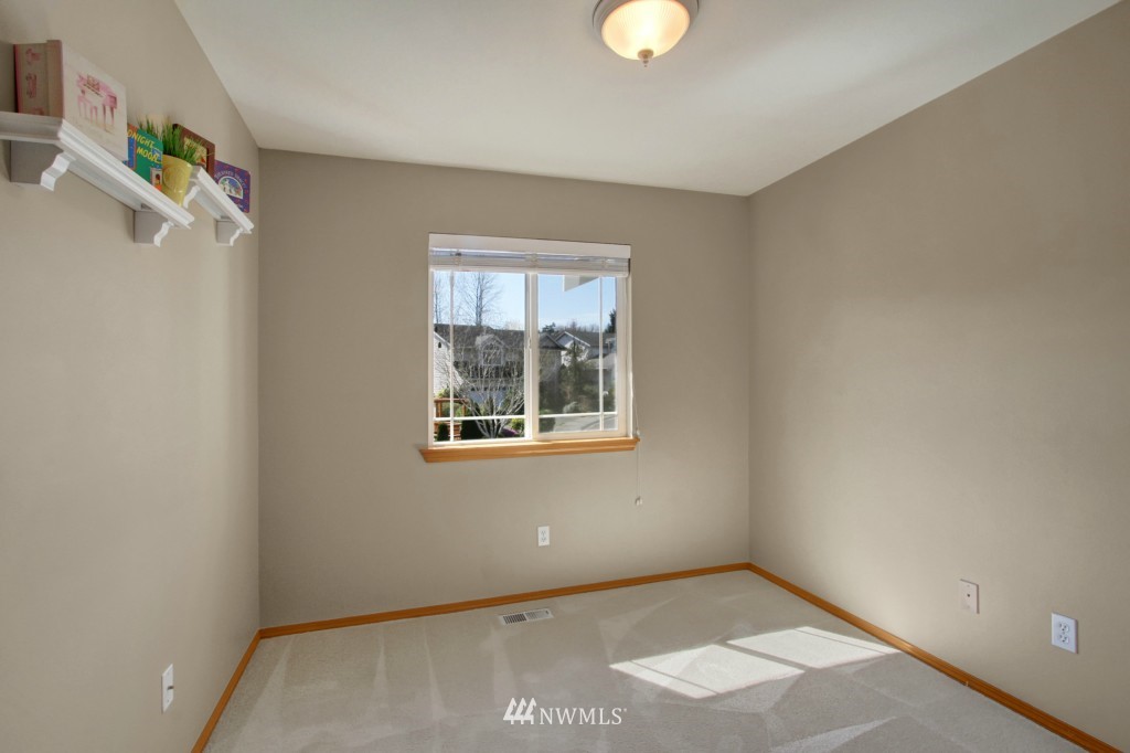 24219 13th Place West Bothell, WA 98021 - Photo 10 of 18 an empty room with windows