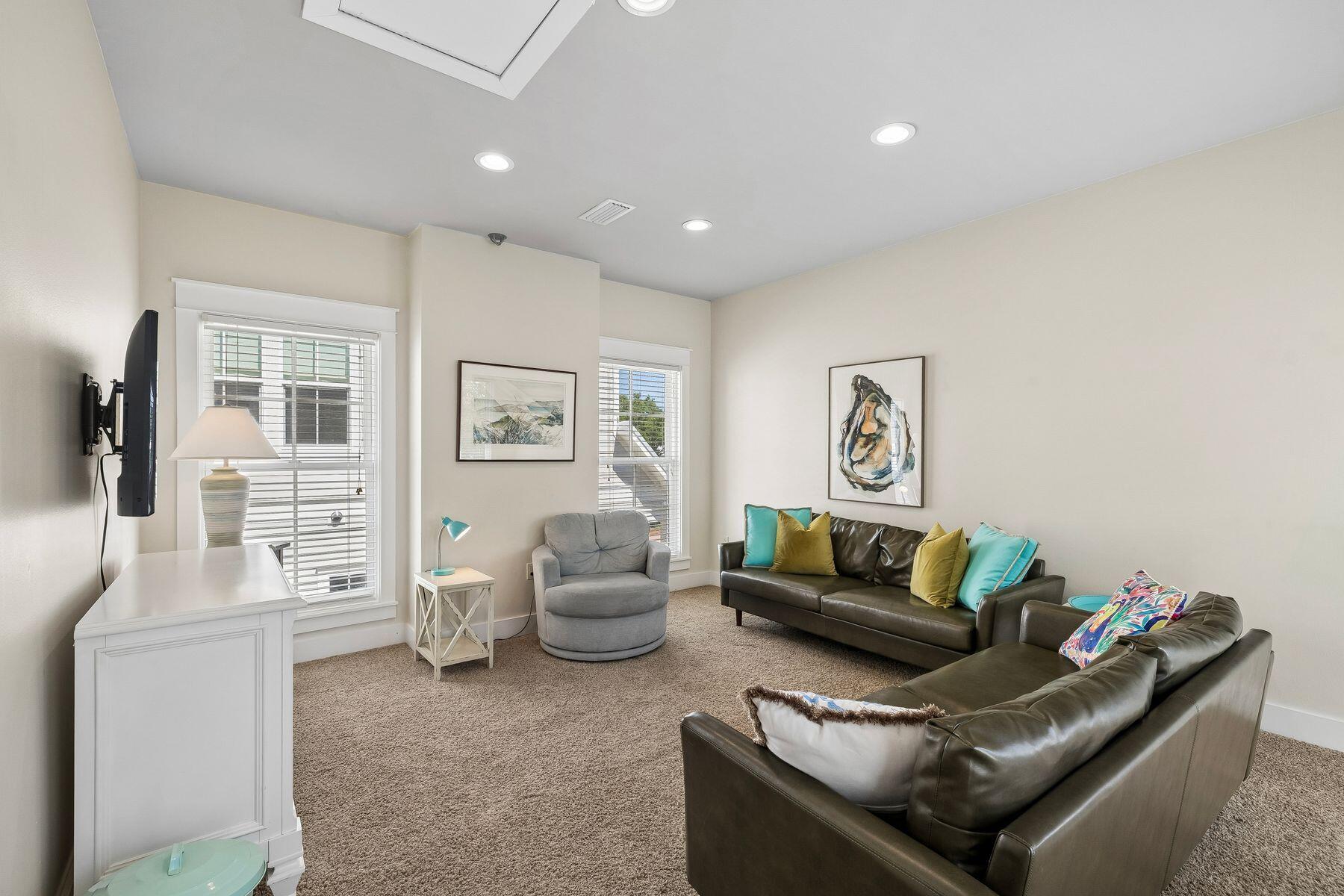 39 Willow Mist Road Inlet Beach, FL 32461 - Photo 23 of 41 a living room with furniture and a flat screen tv