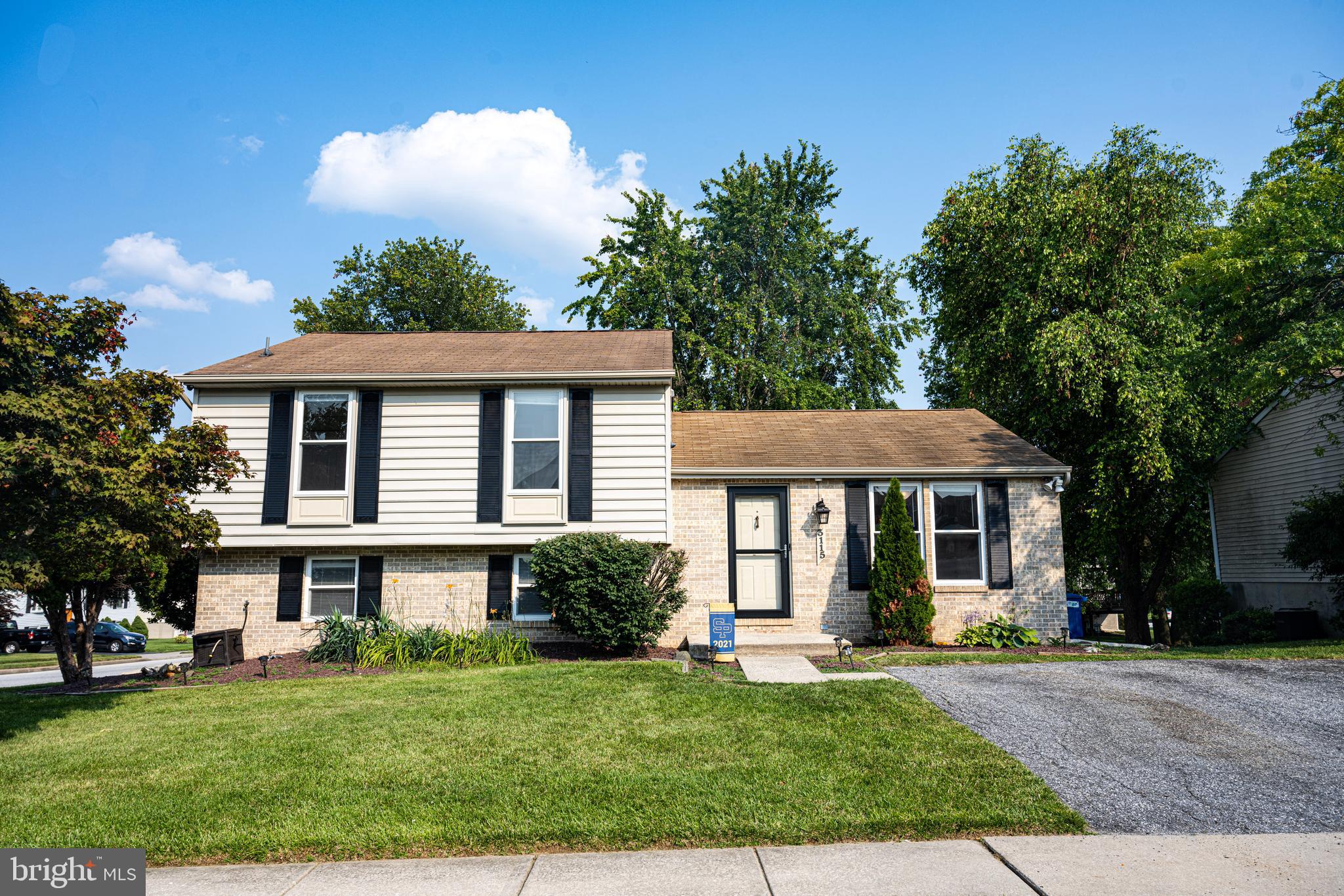 3115 Northmont Road Windsor Mill, MD 21244 - Photo 1 of 49 a front view of a house with a yard