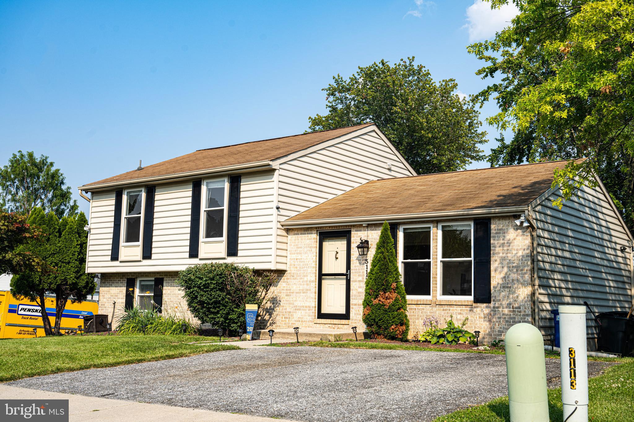 3115 Northmont Road Windsor Mill, MD 21244 - Photo 2 of 49 a front view of a house with a yard