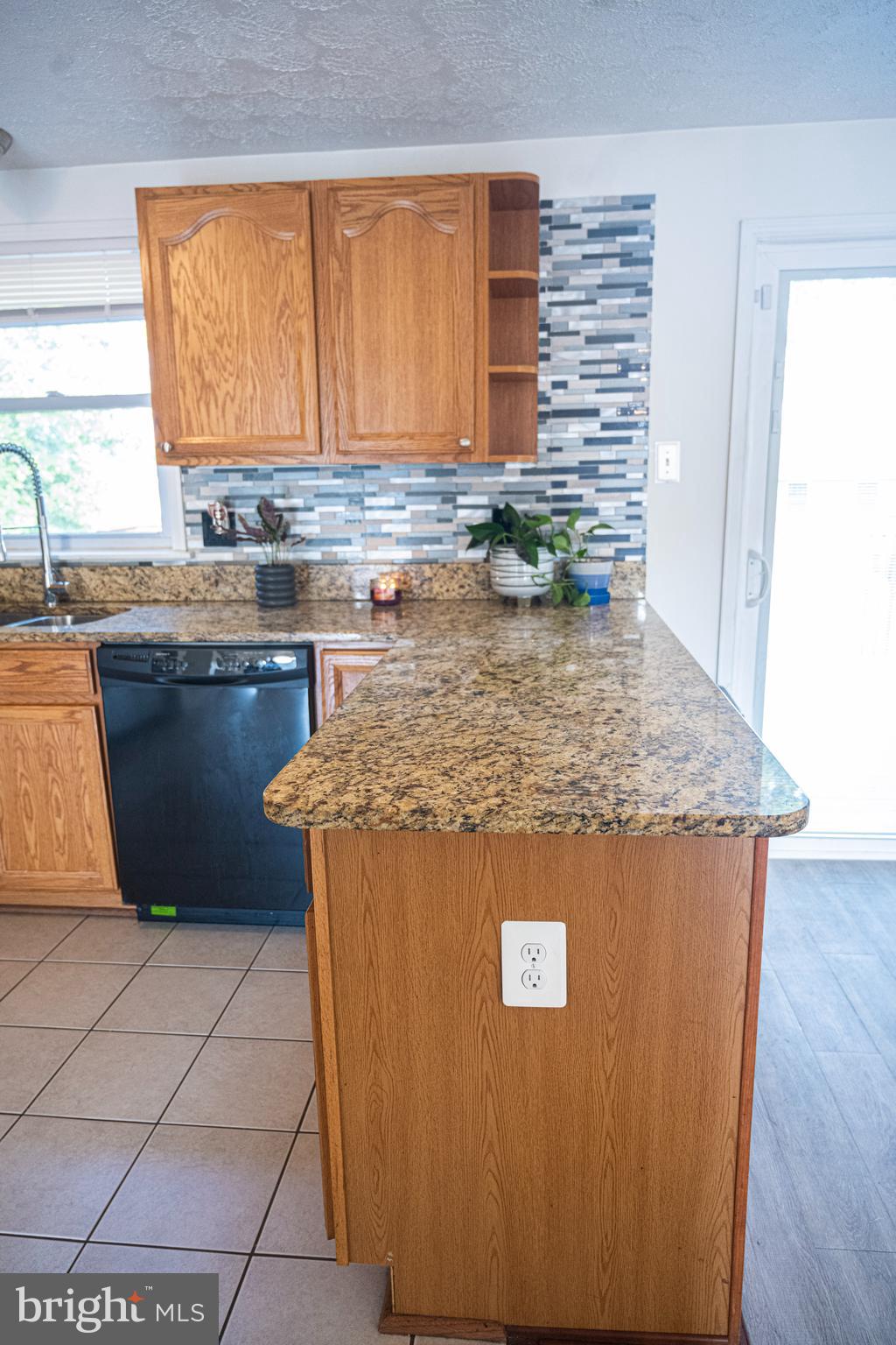 3115 Northmont Road Windsor Mill, MD 21244 - Photo 12 of 49 a view of kitchen with granite countertop window