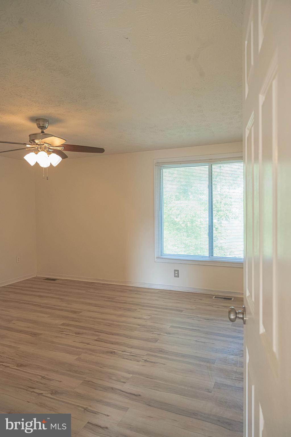 3115 Northmont Road Windsor Mill, MD 21244 - Photo 18 of 49 a view of an empty room with a window