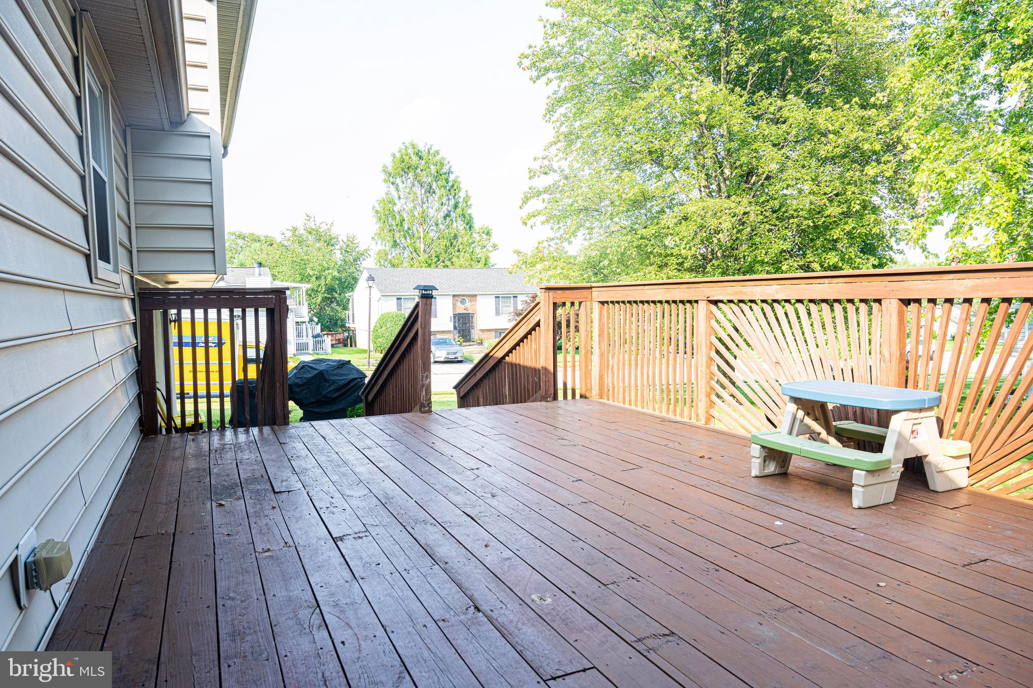 3115 Northmont Road Windsor Mill, MD 21244 - Photo 46 of 49 a view of balcony with wooden floor and outdoor seating